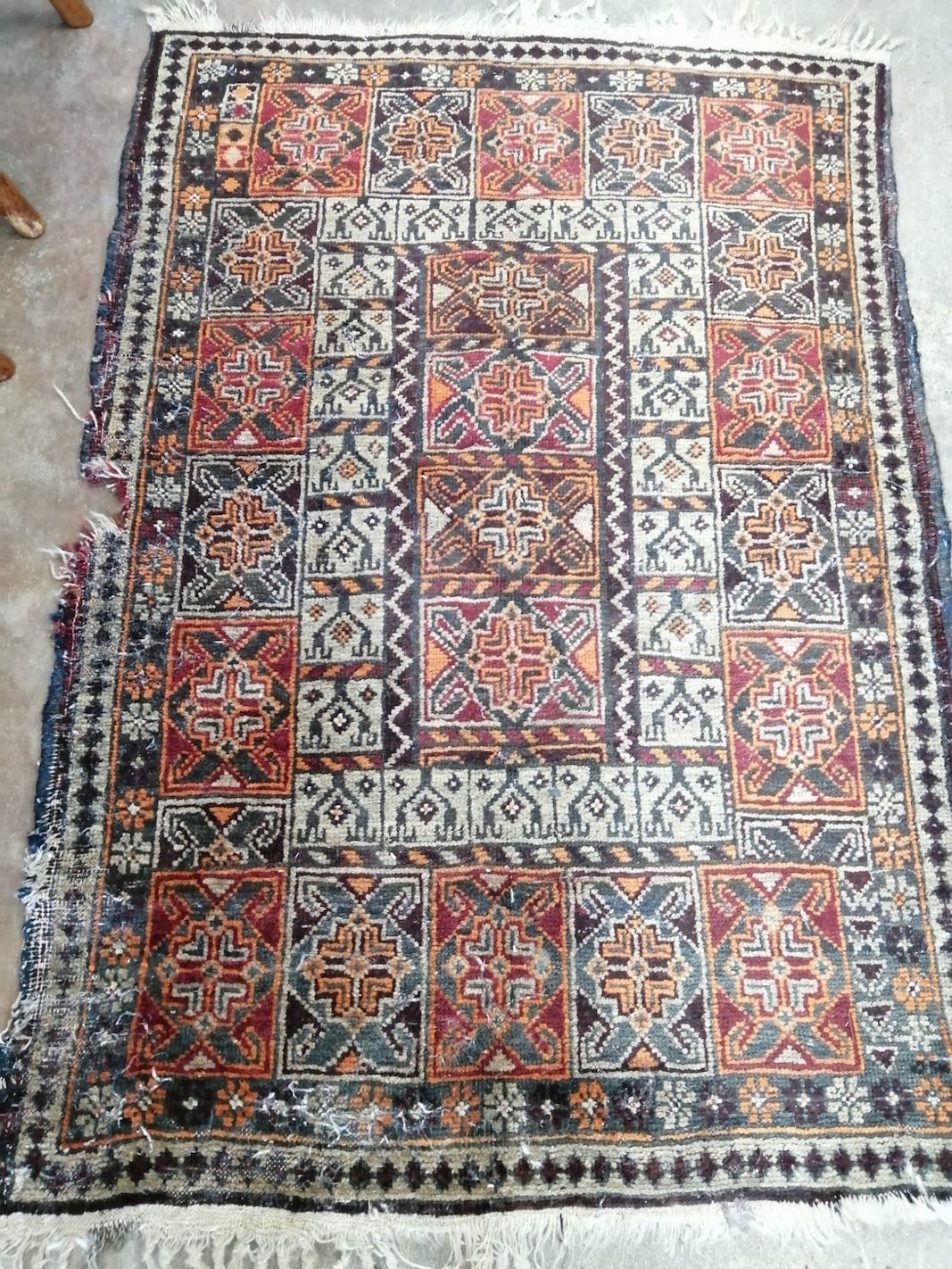 A Belouch rug and a North West Persian rug, larger 220 x 110cm